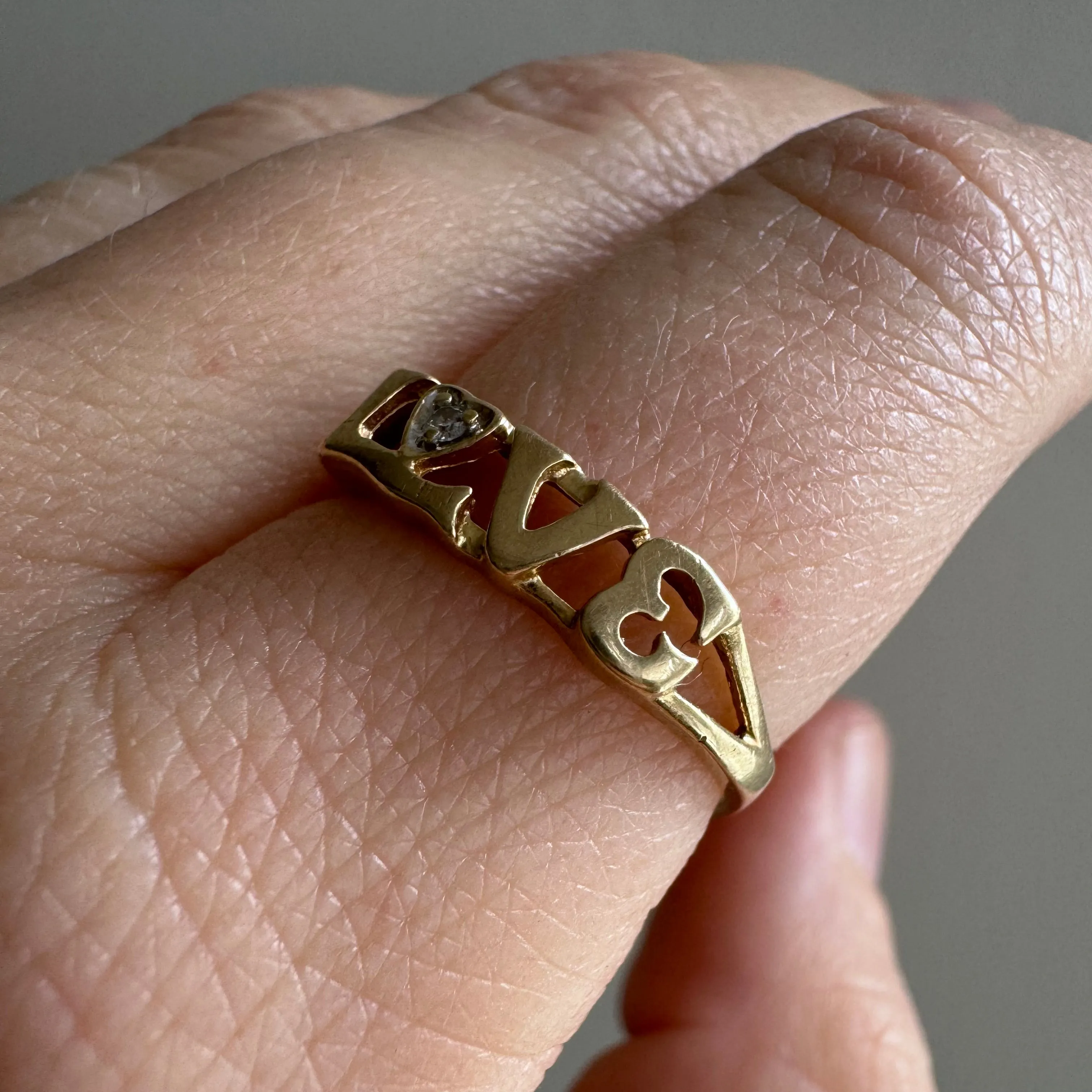 V I N T A G E // LOVE / 10k and diamond love word ring / size 6.75